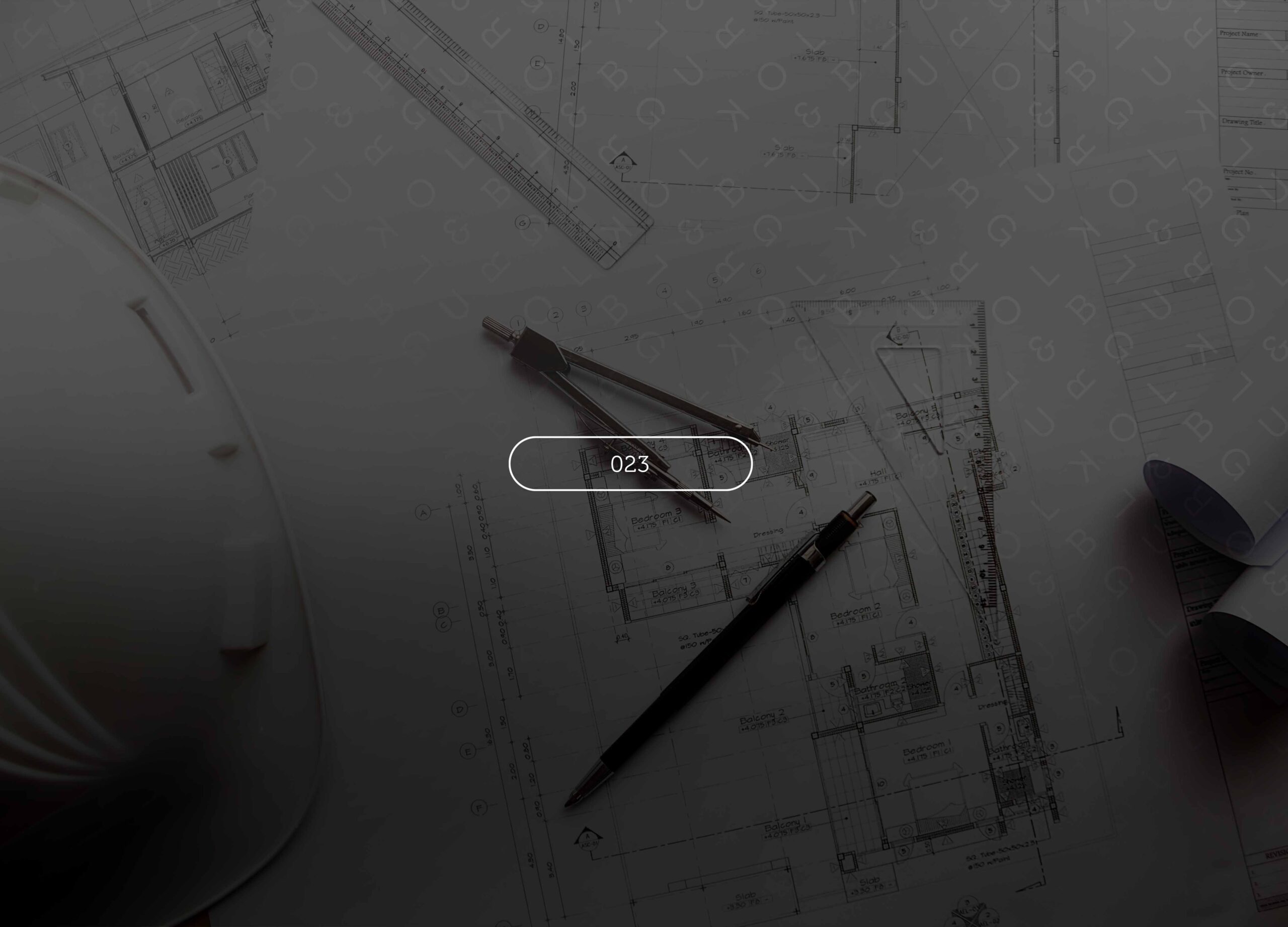 Architect's desk with blueprints, a hard hat, compass and pencil