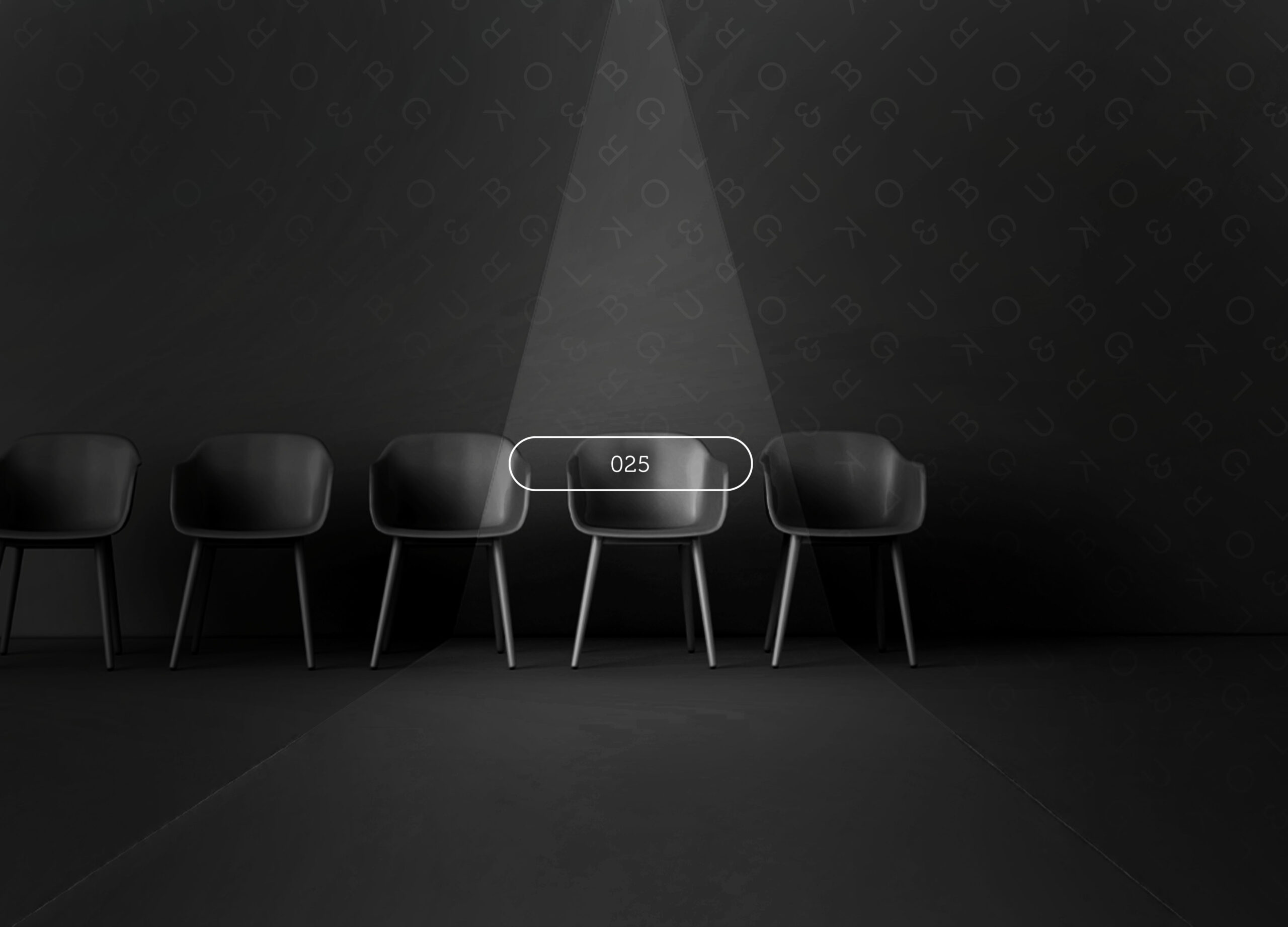 Row of dark chairs with a spotlight on one empty chair